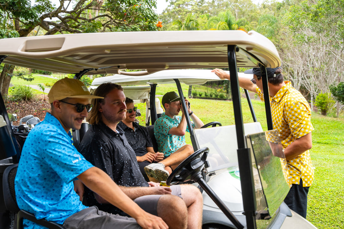 Golf Polos on Golf Course in a Cart. 